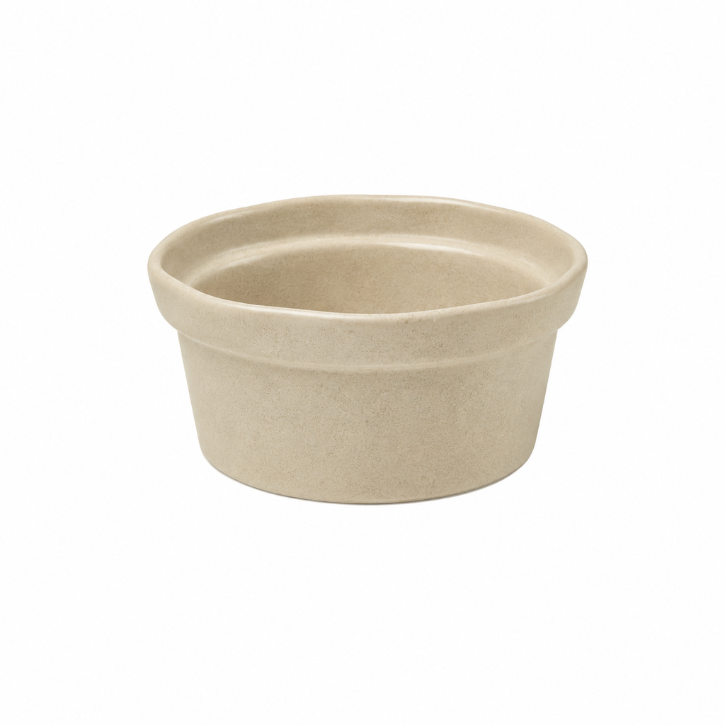 A small round ceramic ramekin with a flared rim, shown on a plain white background.